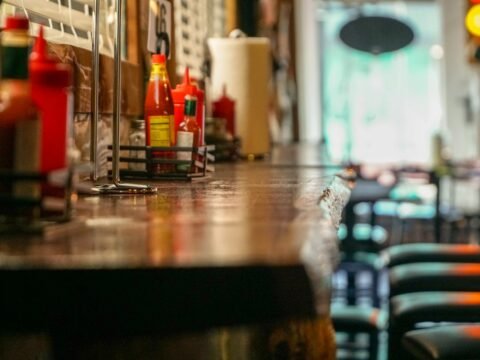 selective focus photography of bottles on table